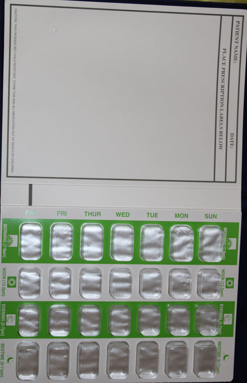Prescription label with medication slots for a 7-day pill organizer.